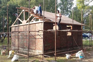 FC2C470E42ADA29-Construction-workers-make-quake-proof-houses-for-Shigeru-Ban-Nepal-House-Project.jpg